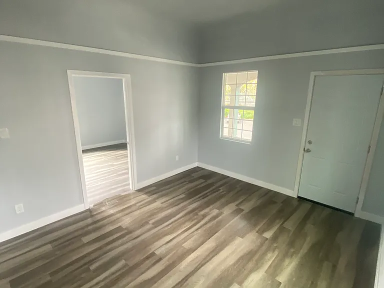 Living Room/Front Door, Bedroom #1 to left