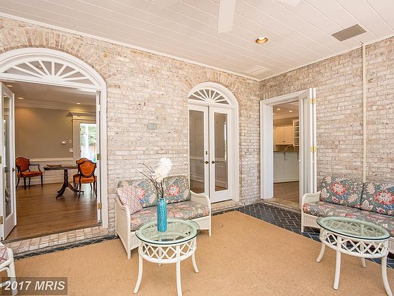 Sunroom with built in seats and planter
