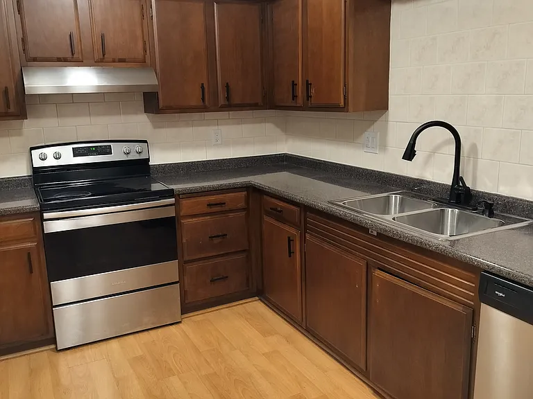 Nice counter space for meal prep and baking. New pull down faucet/sprayer. SS appliances.