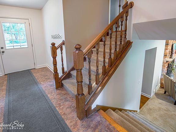 Offers welcome here! Updated flooring, large coat closet