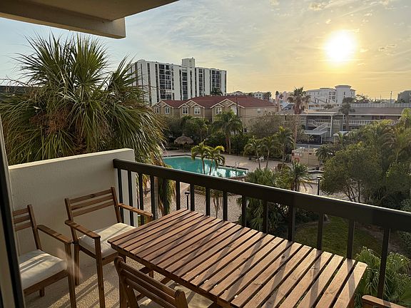 Balcony overlooking pool