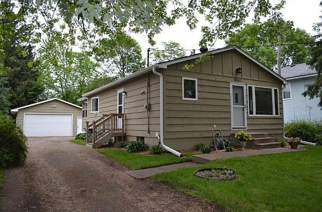 Clean, updated rambler on a quiet street just a few blocks west of downtown Mound. Great location!