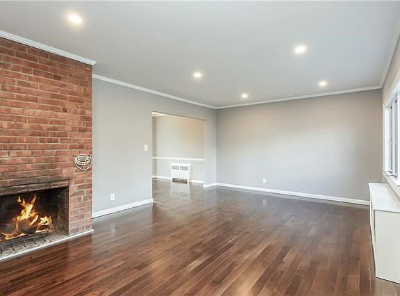 Living Room with fireplace and beautiful hardwood floors