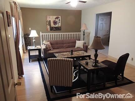 Living room
						:
						Stairs lead to basement