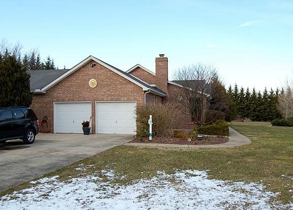 Large 2 car garage w/remotes & overhead compressor