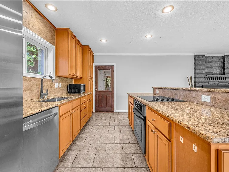 9660 NW Bermar Ln — Photo 7