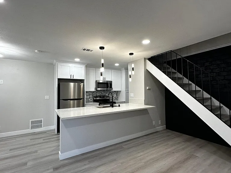 Luxury Vinyl Floors. Recessed Lights. New Kitchen with all new appliances.