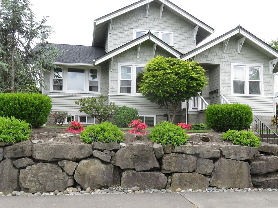 3 story beautiful craftsman with full 3 bedroom apartment downstairs, 2 kitchens,3 bathrooms, 4 large bedrooms upstairs New roof