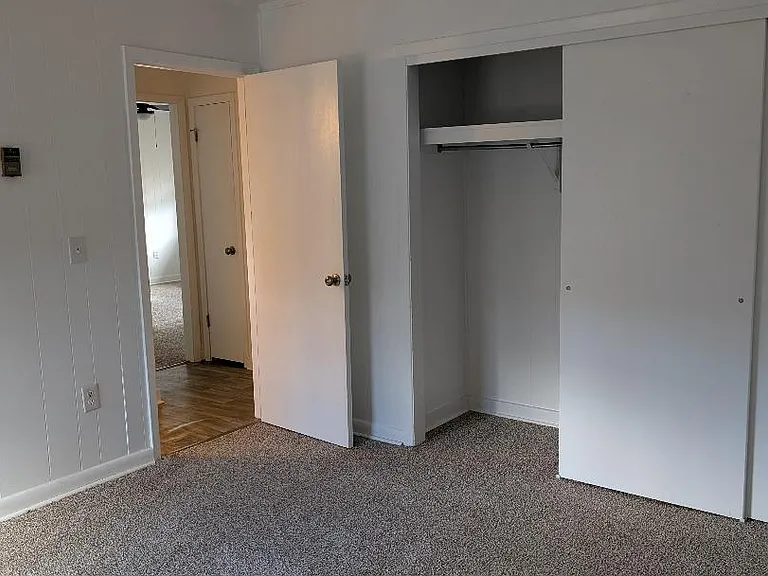 BEDROOM WITH LARGE WALK IN CLOSET. AMPLE STORAGE SPACE