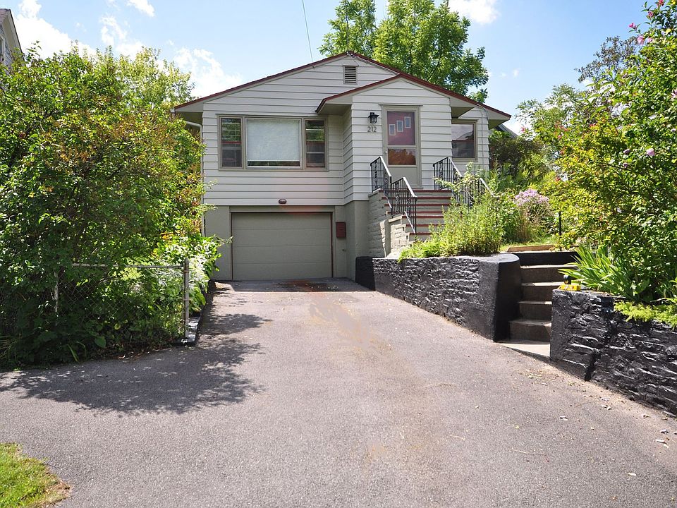 View of driveway and Energy Star rated garage.