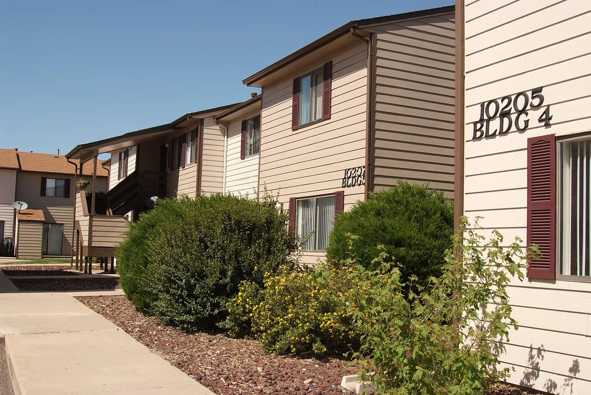 Most units have ground level entry and patio with storage shed. - Kipling Townhomes