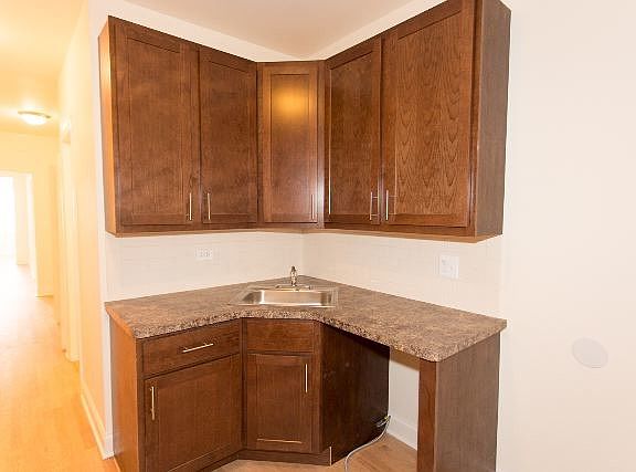 3rd image of 4869 N Washtenaw Ave #Igone