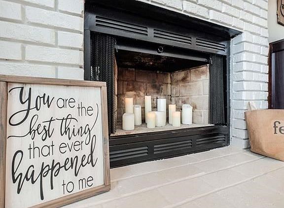This adorable wood burning fireplace sets the perfect mood all year long.