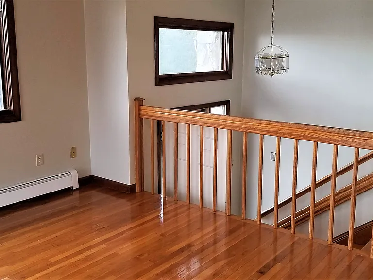 living room stairs down to lower level