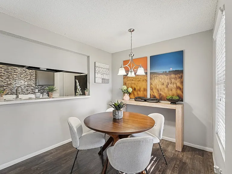 Contemporary Dining Area with Natural Light in Waco Apartments