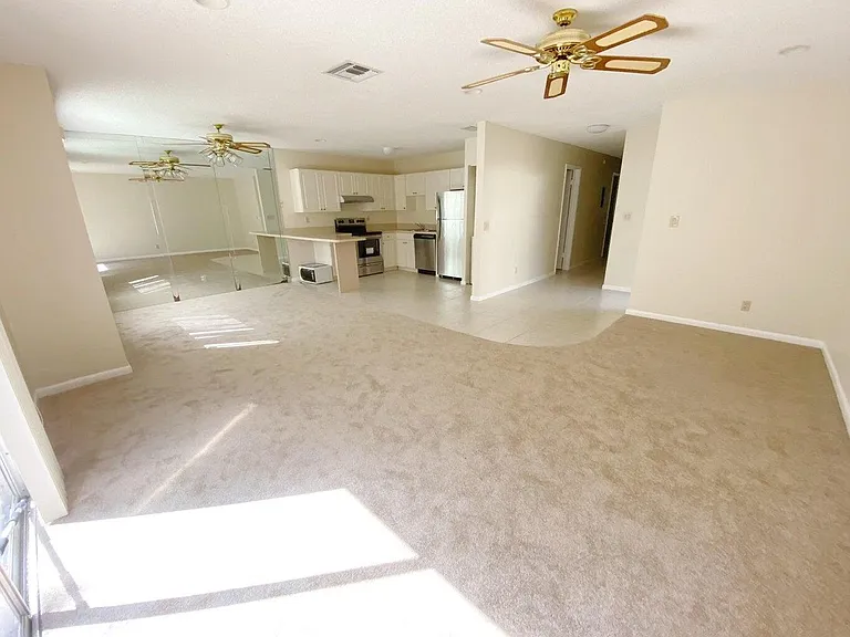 4477 NW 3rd Dr — Photo 1