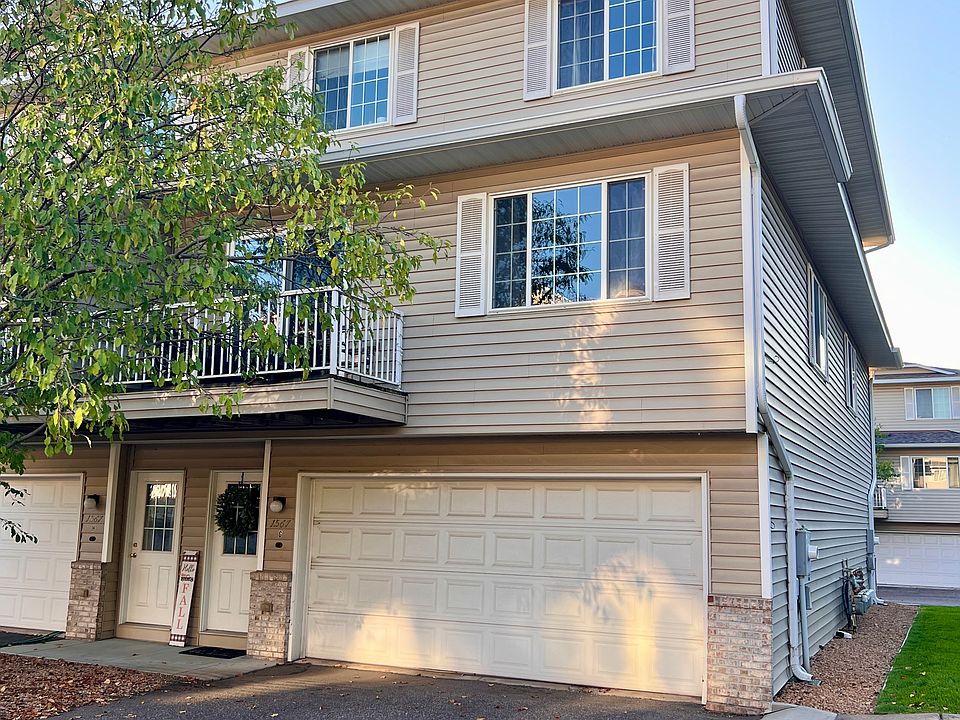 North end unit with 2 car garage and parking for 2 cars in the driveway for visitors!