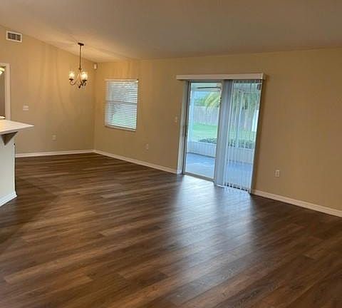 LIVING ROOM LOOKING AT DINING AREA