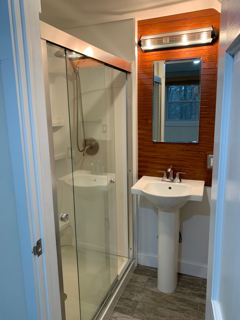  Upstairs bathroom custom cabinetry, built in shower