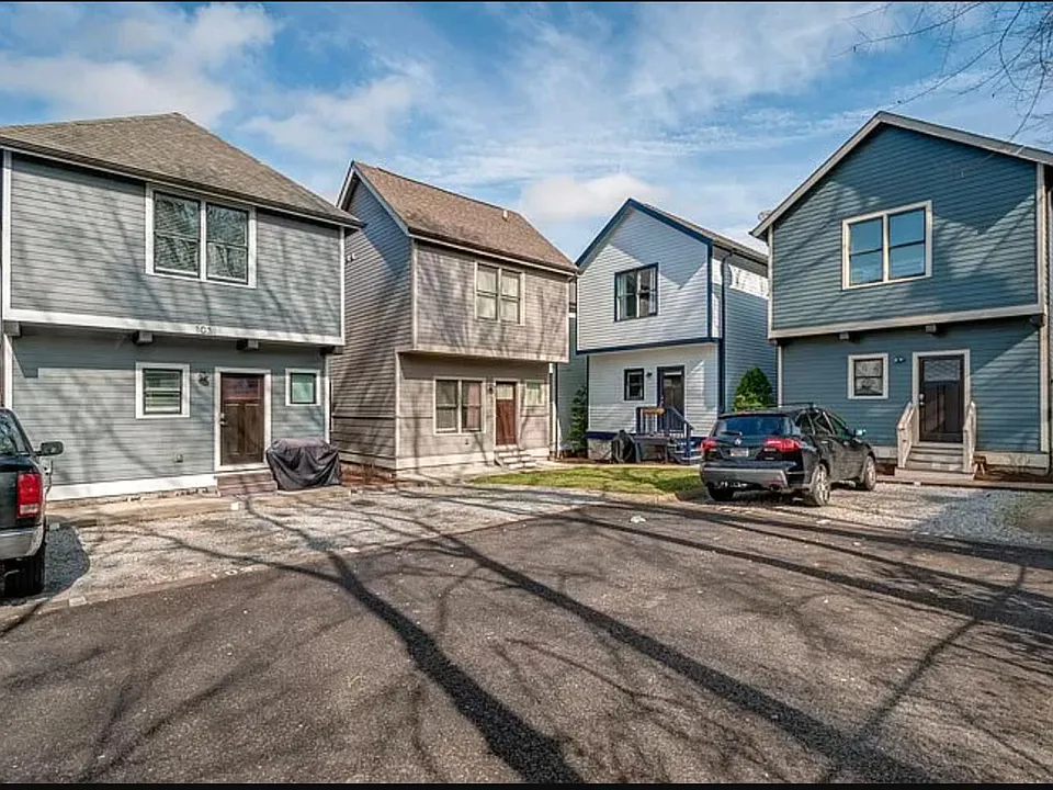 Second house from the left; One designated parking spot
