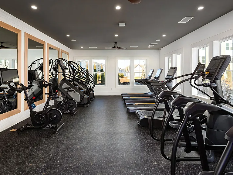 Cardio Room Featuring Bikes, Ellipticals, Treadmills, and Step Machines