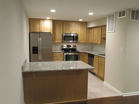 Living room looking into kitchen
