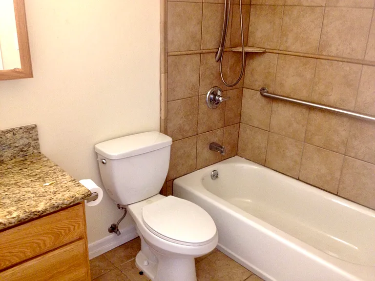 Updated bathroom in USC student rental with modern fixtures - perfect for shared graduate housing