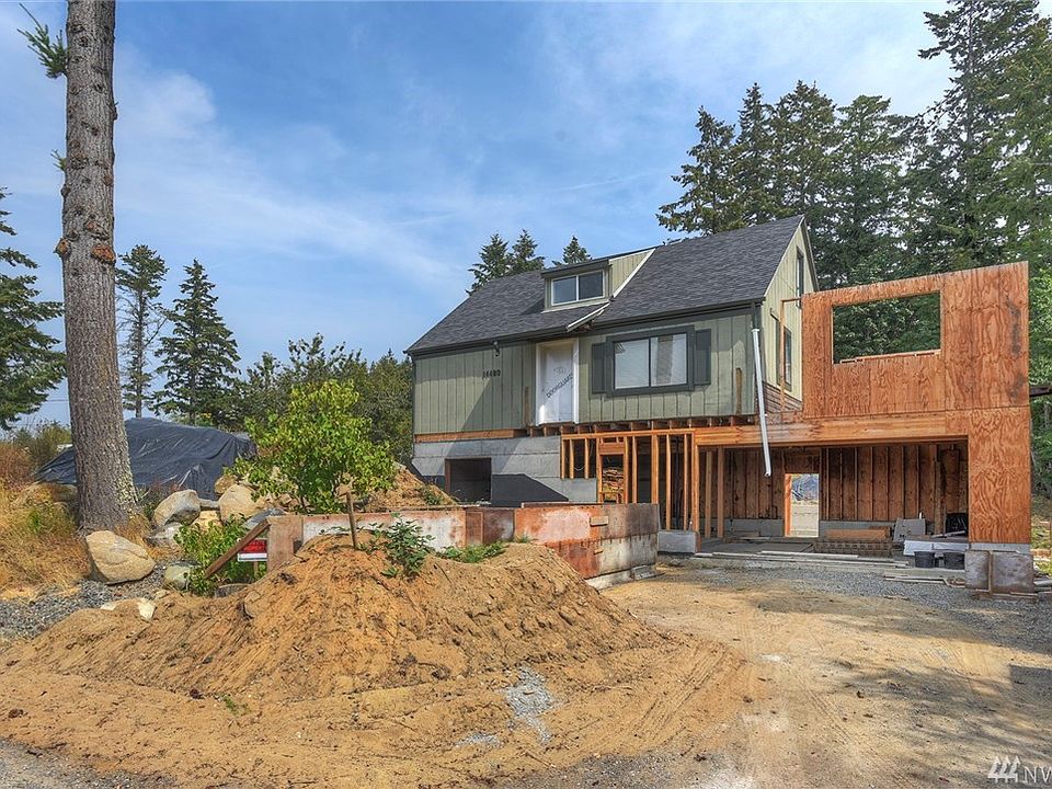 Level drive into new addition. Ready for new front deck. Forms are ready for concrete access to future front steps.