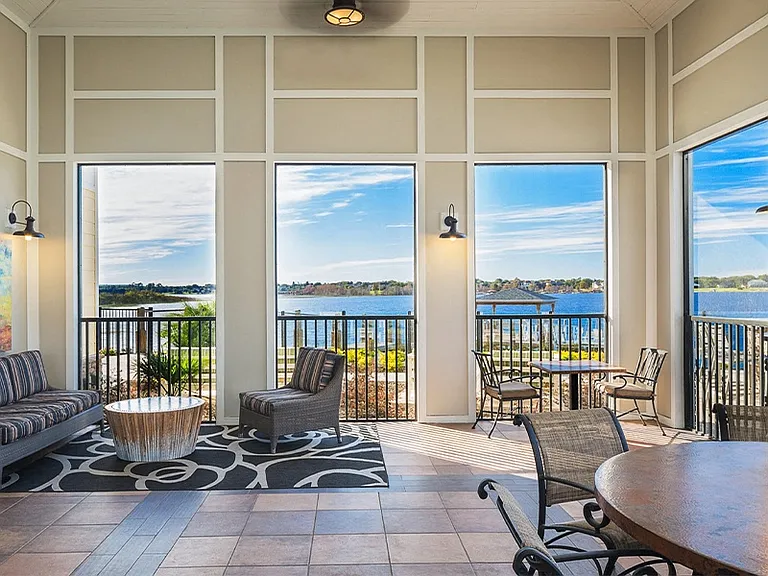 The clubhouse also features a screened-in outdoor lounge