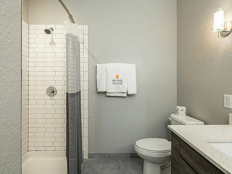 Explore this chic bathroom featuring a modern shower and contemporary design elements.