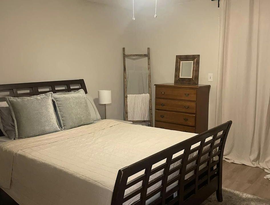 Primary Bedroom with a full bathroom and own balcony.