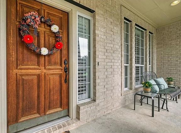 The covered front porch is the perfect place to enjoy a quiet, cool evening.
