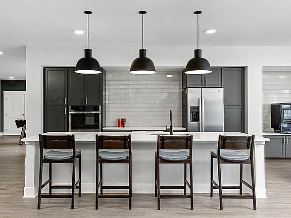 Sleek Modern Kitchen with Stainless Steel Appliances
