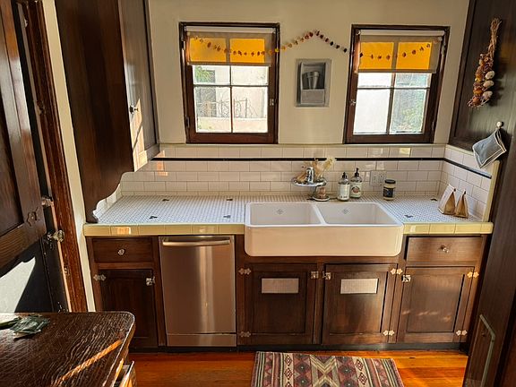 Chef's kitchen: Farm sink, dishwasher , abundant natural light