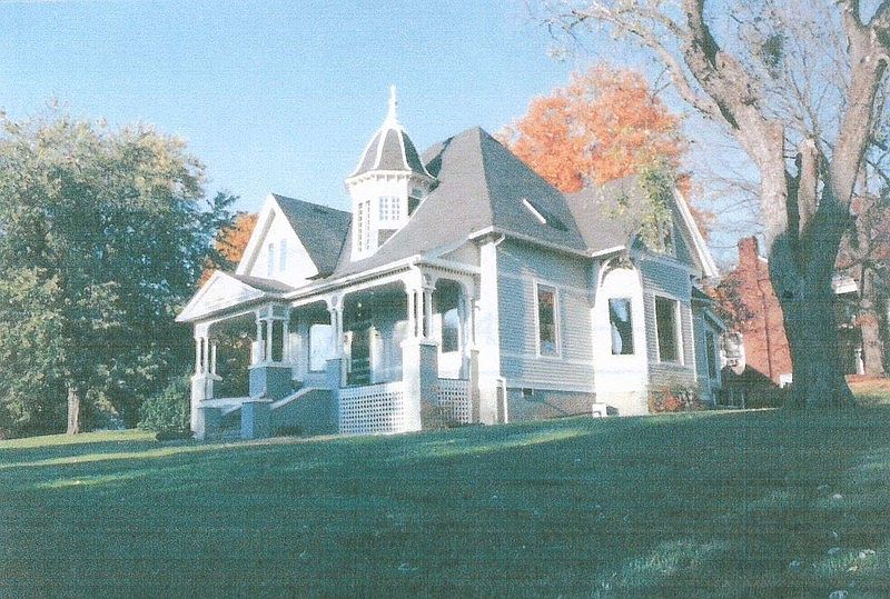 The house sits on Morgan St. lined with many historic homes and mature trees
