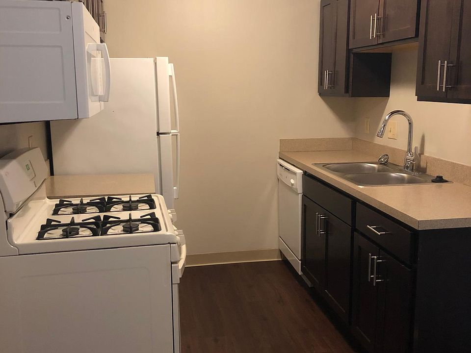 Kitchen includes microwave, dishwasher, and garbage disposal.