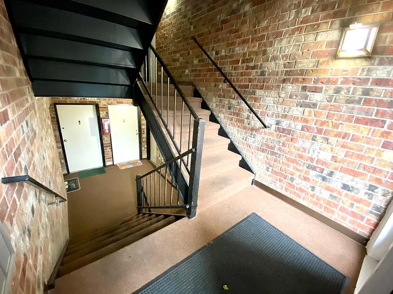 View when you enter building, unit is downstairs on the right
