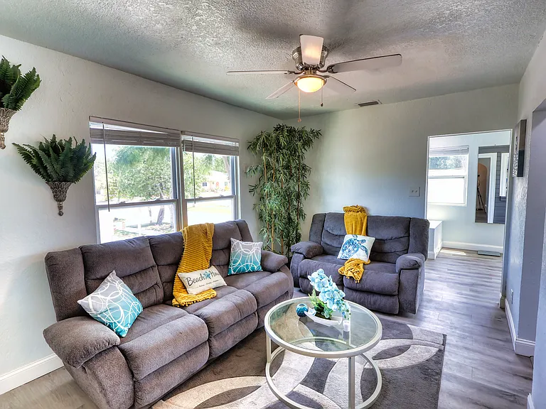 Unit is professionally staged; furniture and decor shown in photos are not included. Rented unfurnished.