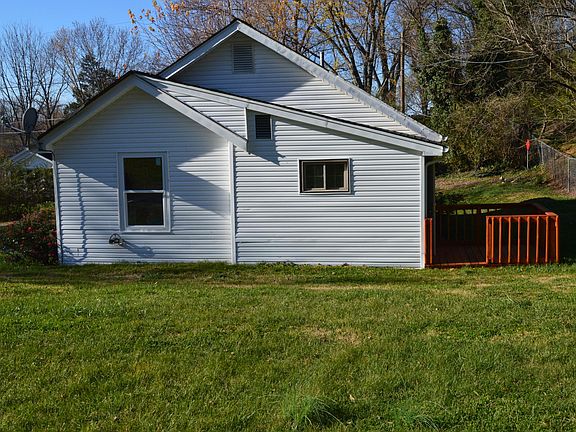Back of home and small back deck.