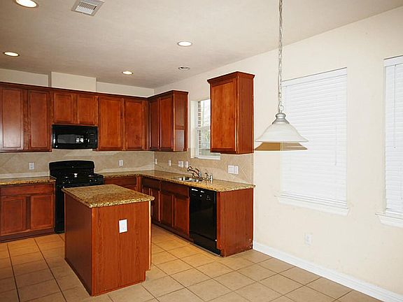 Nice granite counter tops that opens up to the living room, great for entertaining guests and family