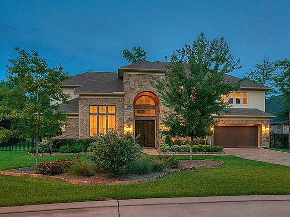 Curb appeal and much more inside this Woodforest gated community of Eagle Pointe.