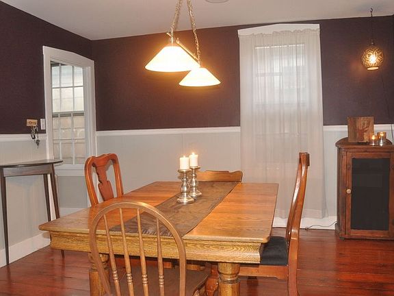Beautiful formal dining room with original hardwood floors