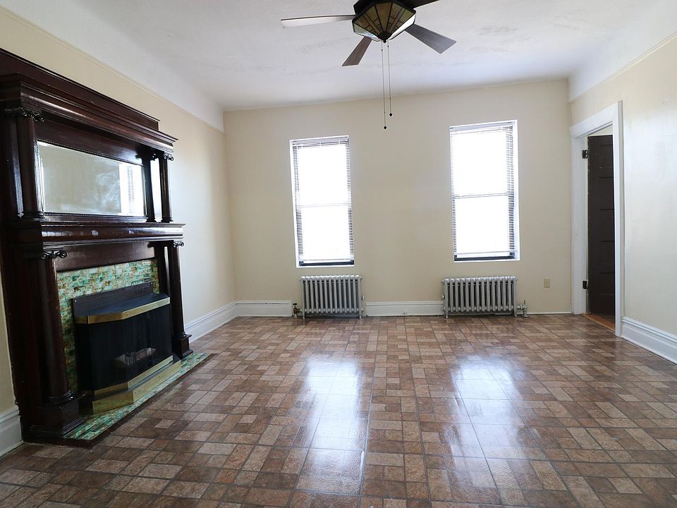 Living room that features aesthetic non working fireplace