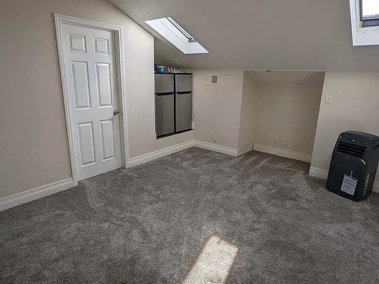 A game room between the two upstairs bedrooms. Include a media alcove, a data hub for wired CAT5 and Cable connection and their own refrigerator. Also not there is a separate AC unit just for this room.