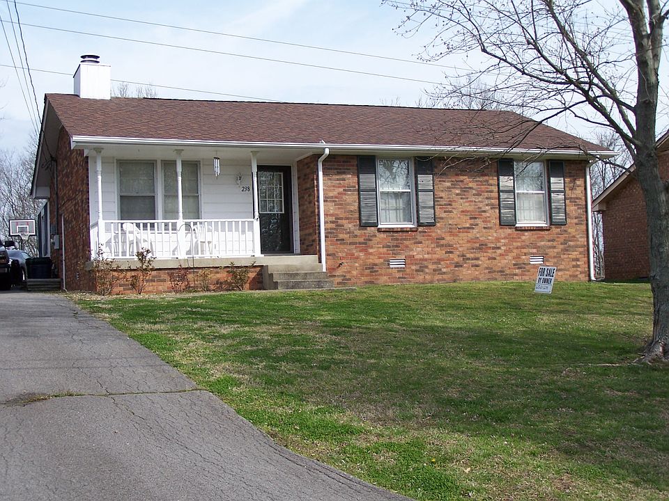 Front with covered porch for sitting