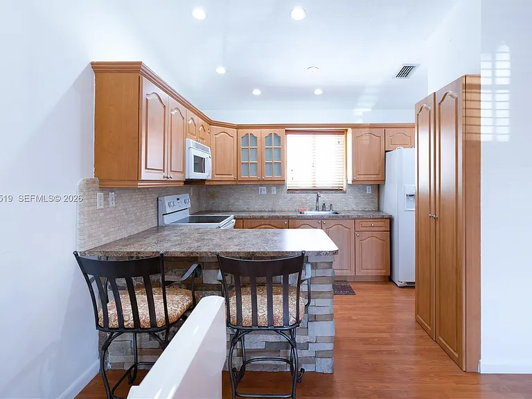 10017 W Okeechobee Rd #202 — Photo 4