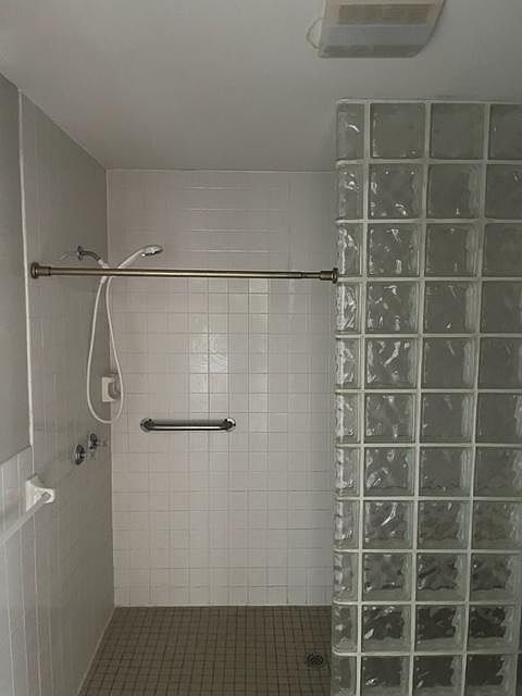 bath with walk in shower