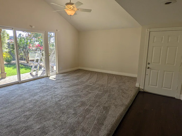 Another photo of the massive formal living / dining and the front door