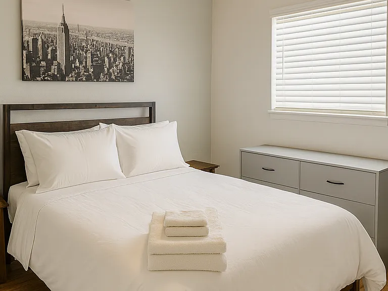 Guest bedroom with 1 full-size bed and plenty of space to unwind.