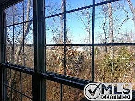 Wooded lot with views from high on the hill. Very private, n